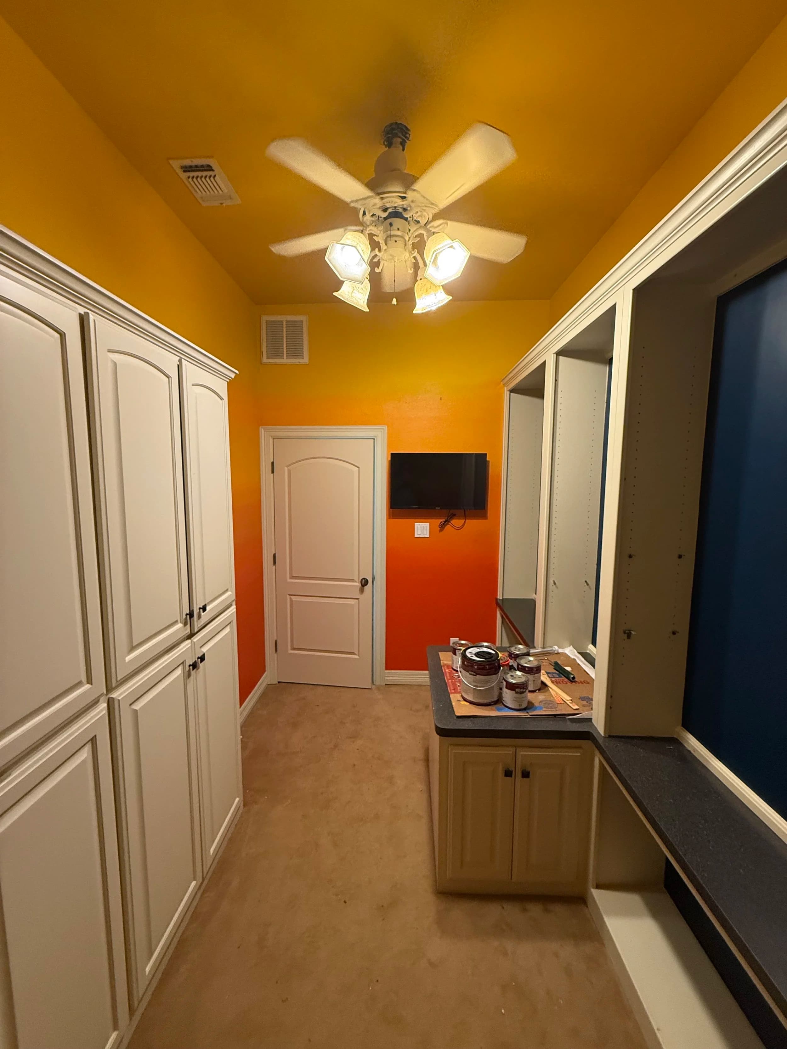 Custom color accent room with built-in cabinetry